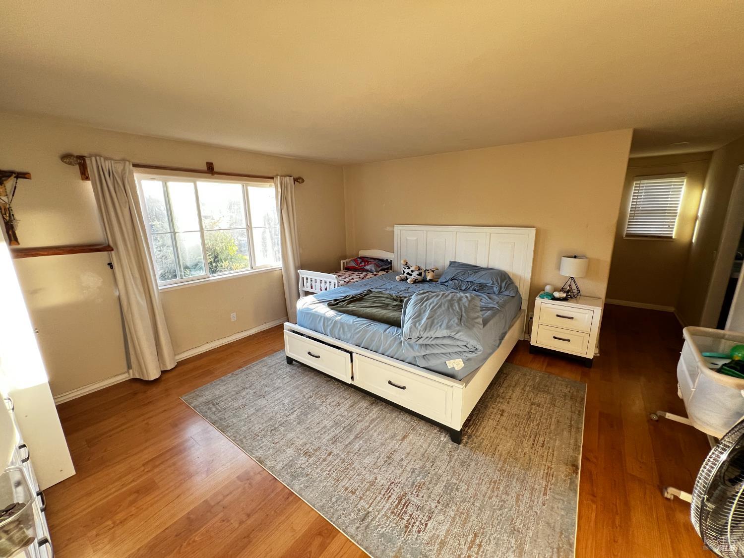 40 Curtis Court Bay Point, CA 94565 - Photo 9 of 18 a bedroom with a bed and a window