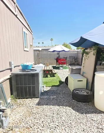 a room with lots of appliances and cabinets