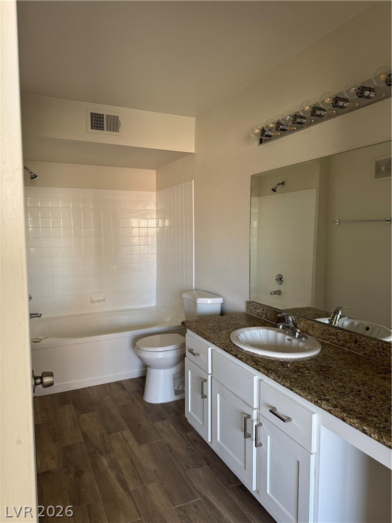 8101 West Flamingo Road, Unit 1040 Las Vegas, NV 89147 - Photo 22 of 22 This bathroom features a contemporary vanity and a tiled shower for a clean aesthetic.