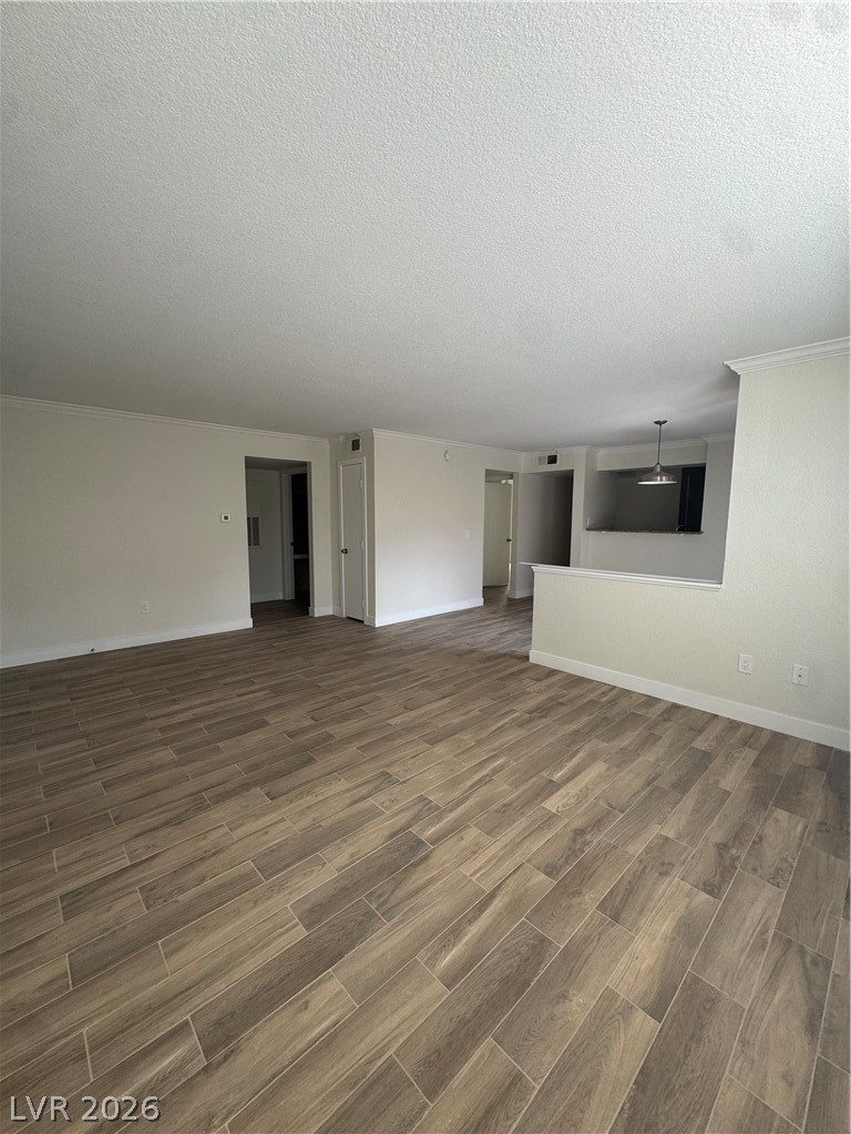 8101 West Flamingo Road, Unit 1040 Las Vegas, NV 89147 - Photo 3 of 22 This interior space features durable flooring, offering a blank canvas for personalization.