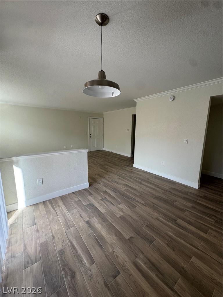 8101 West Flamingo Road, Unit 1040 Las Vegas, NV 89147 - Photo 4 of 22 This interior hallway features sleek flooring and a contemporary pendant light.