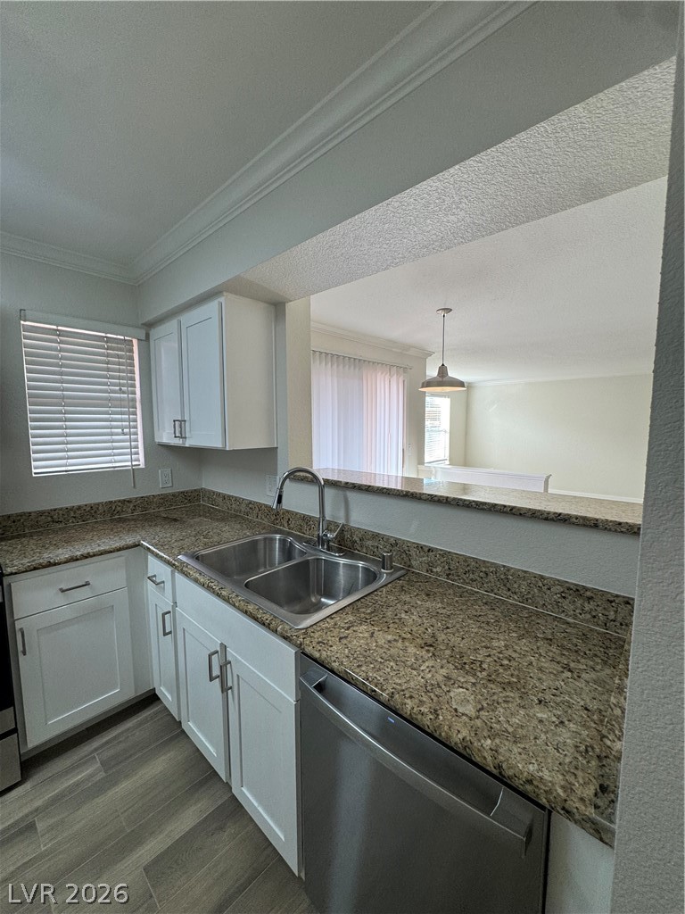 8101 West Flamingo Road, Unit 1040 Las Vegas, NV 89147 - Photo 10 of 22 This modern kitchen features gleaming granite countertops, sleek stainless steel appliances, and ample cabinet space.