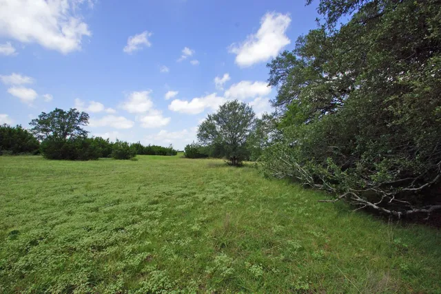 a view of a lake and sunset