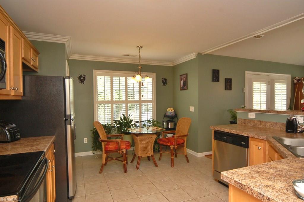 3809 Payne Road High Point, NC 27265 - Photo 12 of 30 Kitchen also features a sunny breakfast area.