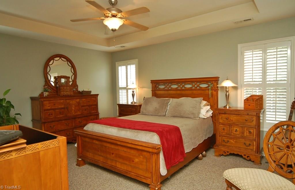 3809 Payne Road High Point, NC 27265 - Photo 13 of 30 Main level master bedroom suite has a wonderful trey ceiling detail.