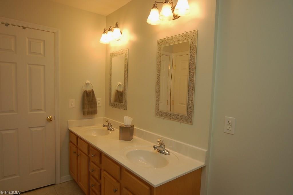 3809 Payne Road High Point, NC 27265 - Photo 15 of 30 Private master bathroom has dual vanities.