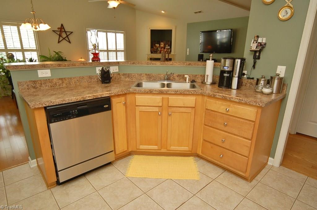 3809 Payne Road High Point, NC 27265 - Photo 9 of 30 Kitchen is open to Great room. Enjoy the breakfast bar.
