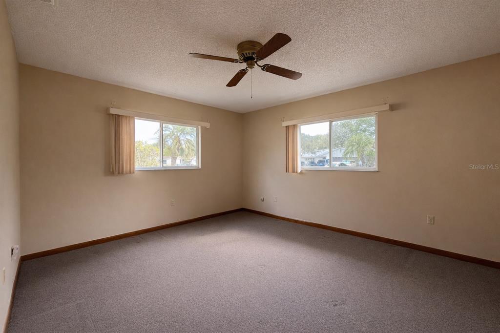 11268 Southwest 75th Terrace Ocala, FL 34476 - Photo 12 of 32 a view of an empty room with a window