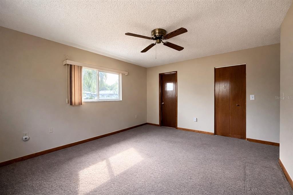 11268 Southwest 75th Terrace Ocala, FL 34476 - Photo 13 of 32 a view of an empty room with a window