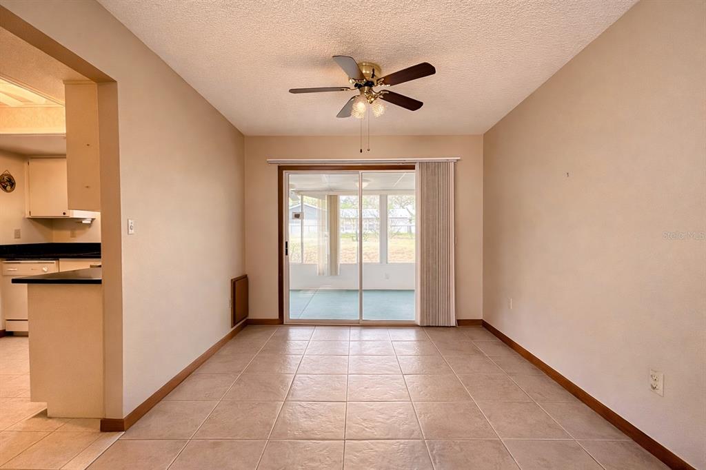 11268 Southwest 75th Terrace Ocala, FL 34476 - Photo 18 of 32 a view of an empty room with a window