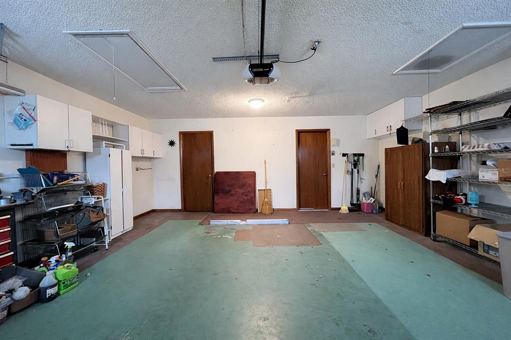 11268 Southwest 75th Terrace Ocala, FL 34476 - Photo 26 of 32 a view of a livingroom with gym equipment