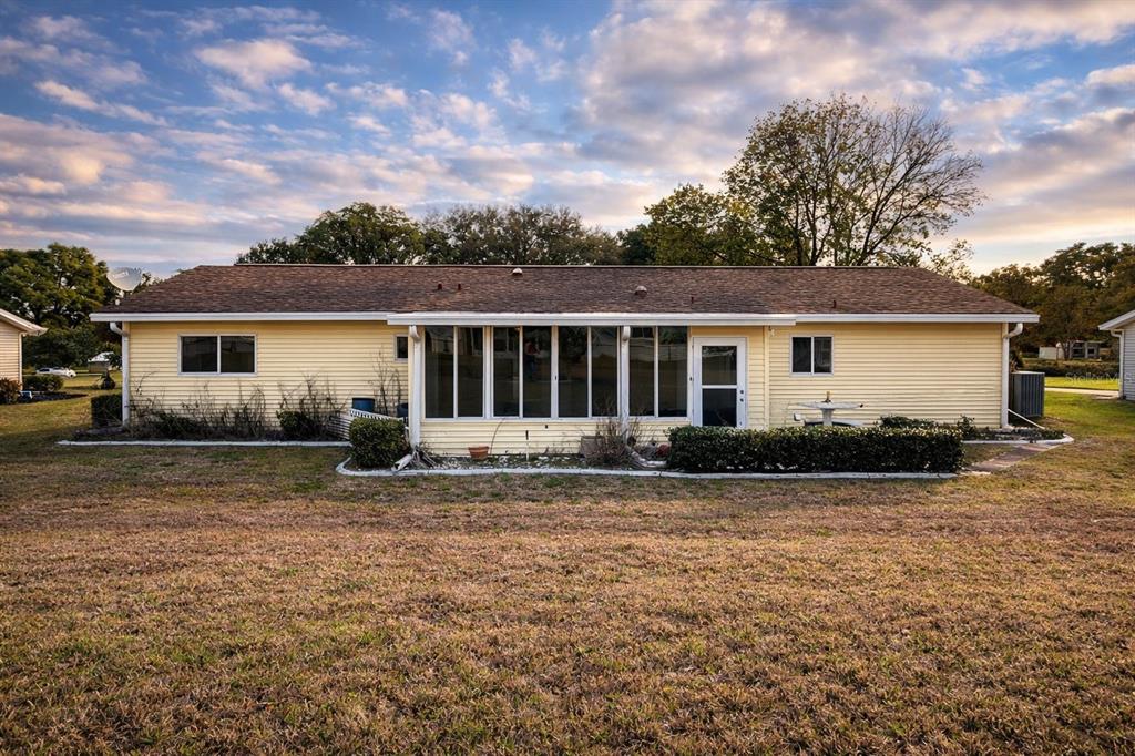 11268 Southwest 75th Terrace Ocala, FL 34476 - Photo 30 of 32 a front view of house with yard and green space