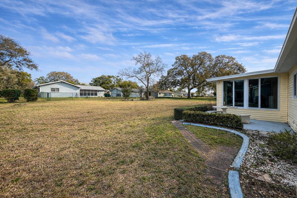 11268 Southwest 75th Terrace Ocala, FL 34476 - Photo 31 of 32 a view of a house with a yard
