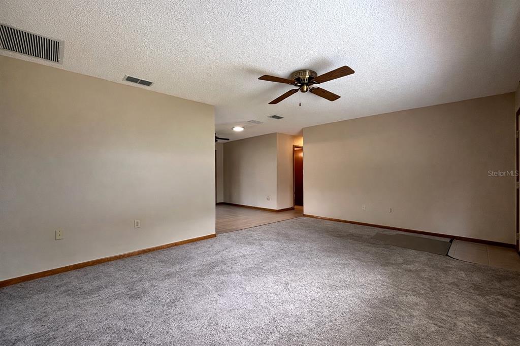 11268 Southwest 75th Terrace Ocala, FL 34476 - Photo 7 of 32 a view of a big room with a projector