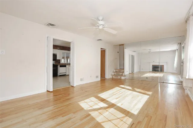 a view of a living room with a stove