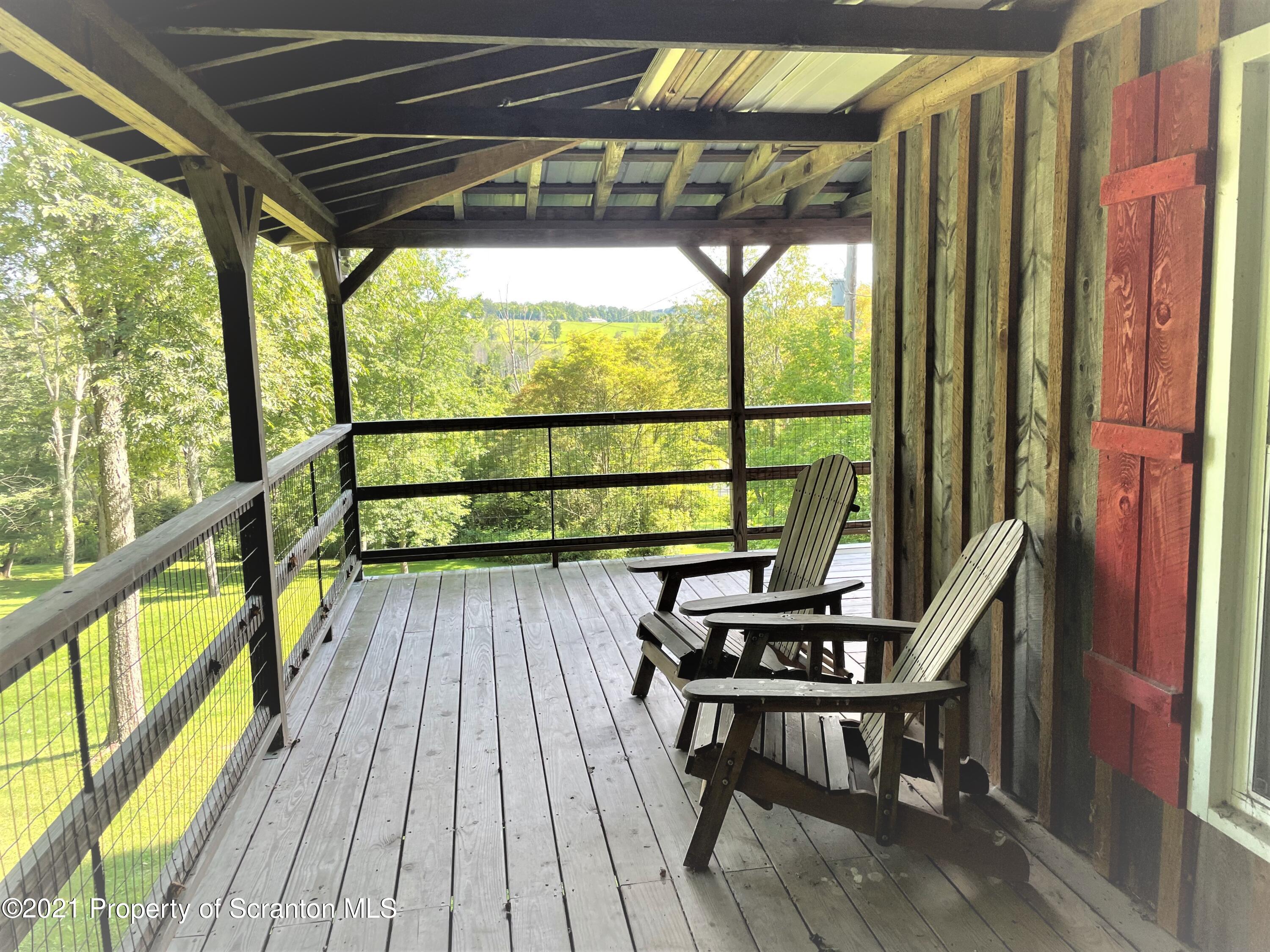 705-771 Hunter Road Springville, PA 18844 - Photo 16 of 62 a view of outdoor space with seating