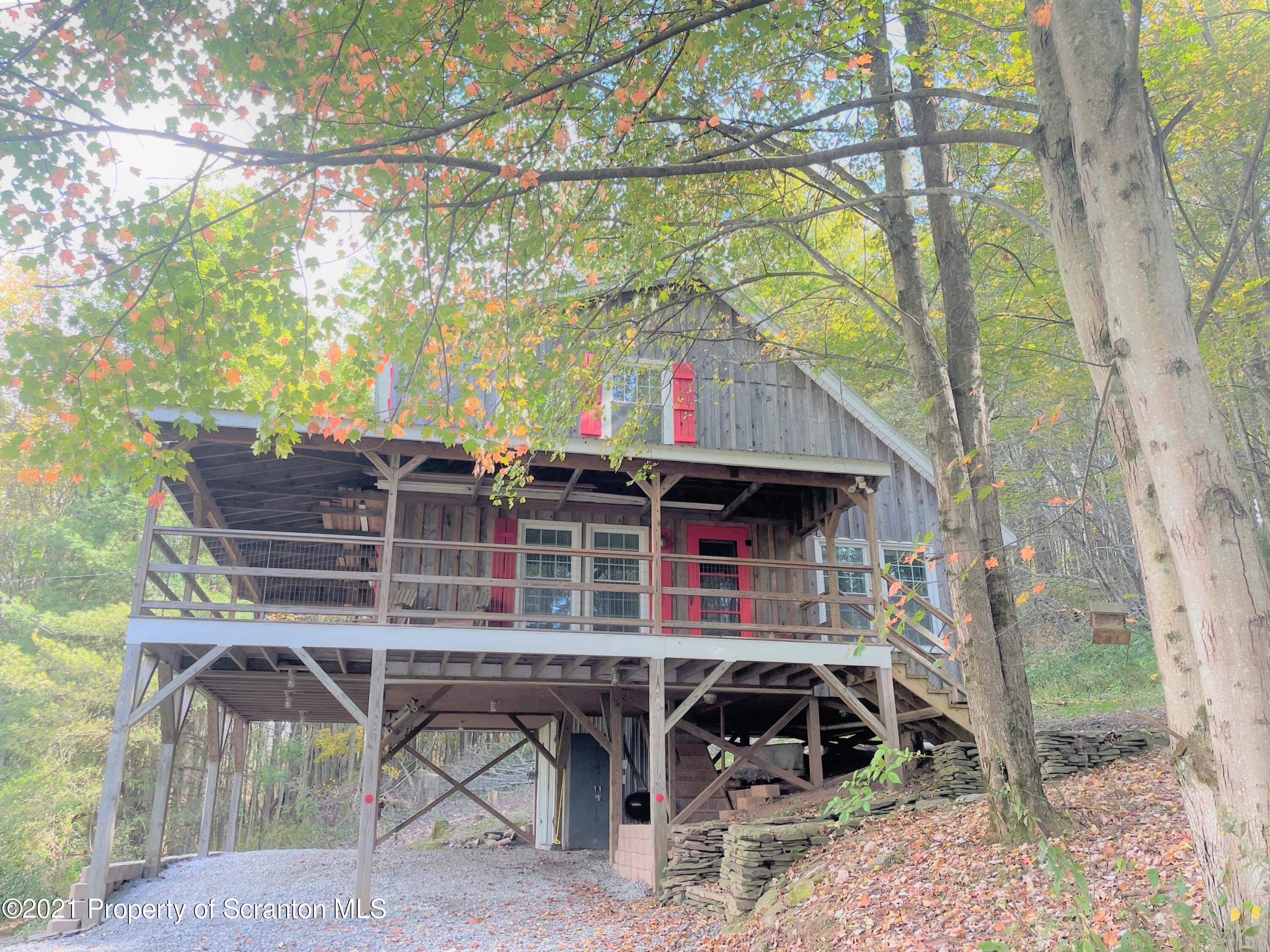 705-771 Hunter Road Springville, PA 18844 - Photo 4 of 62 a view of house with a outdoor space