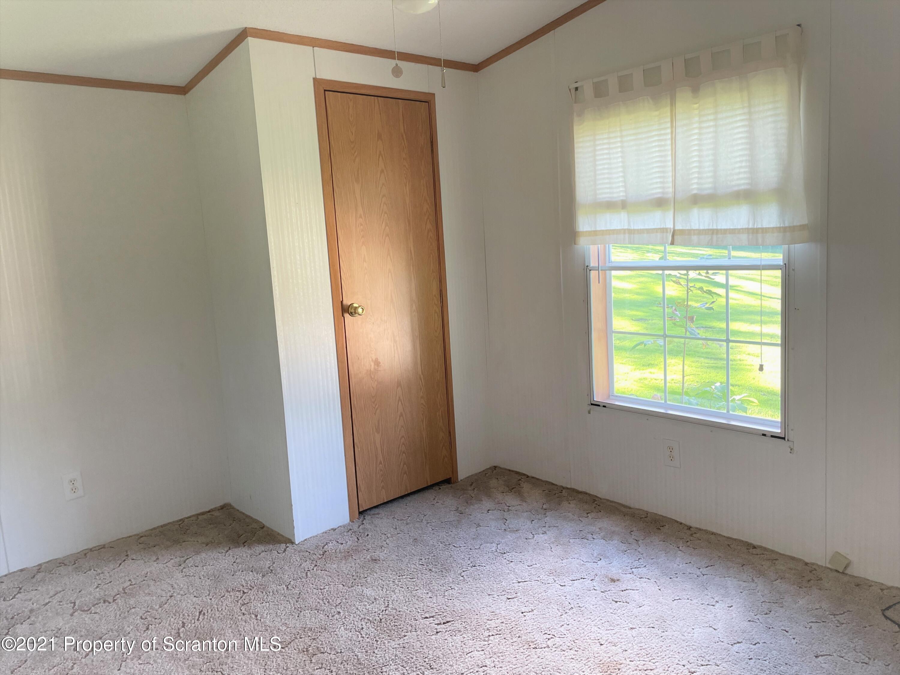 705-771 Hunter Road Springville, PA 18844 - Photo 55 of 62 an empty room with window
