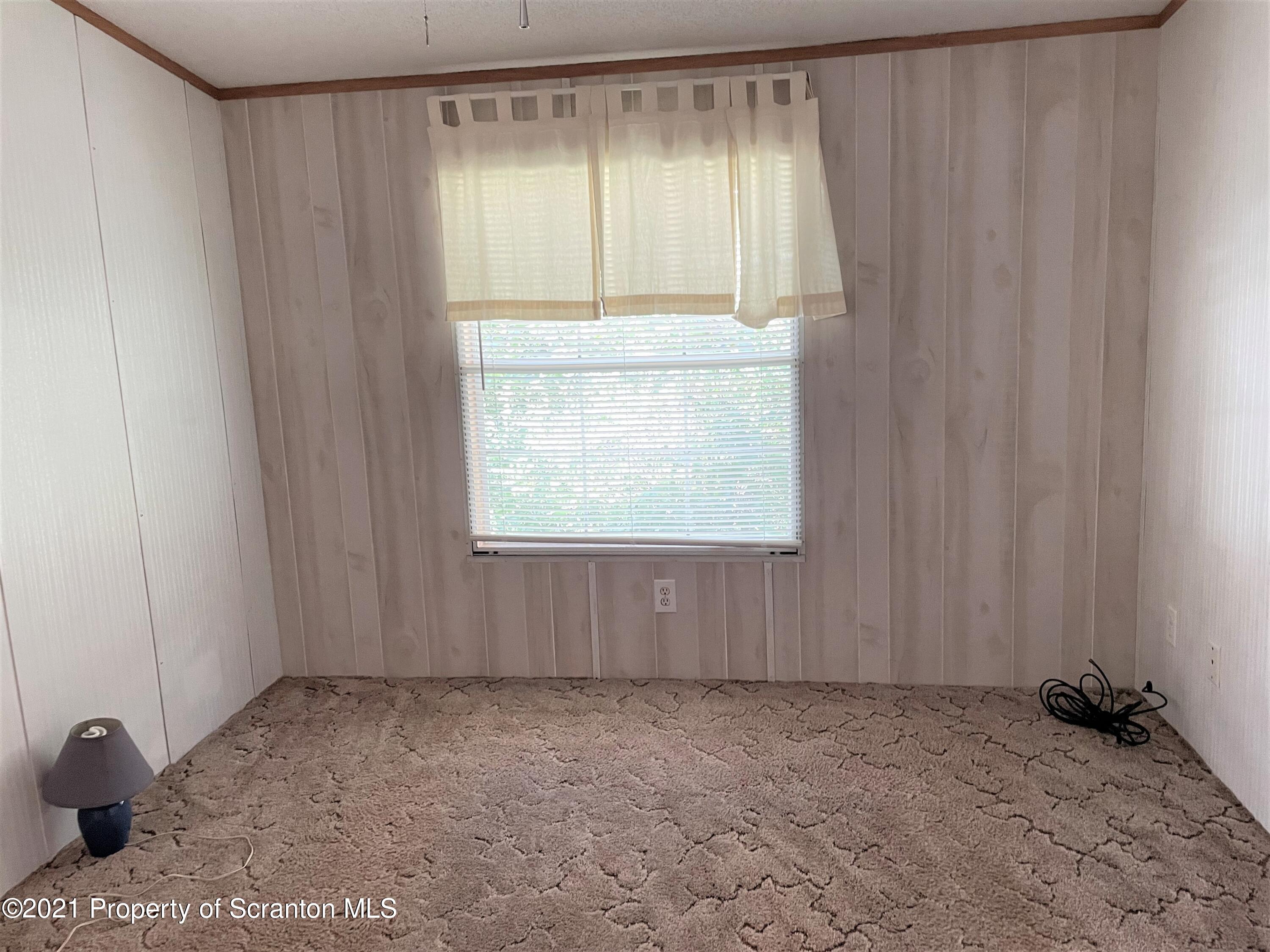 705-771 Hunter Road Springville, PA 18844 - Photo 59 of 62 a view of an empty room with a window