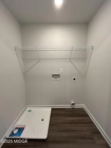 a view of a room with racks on the wall