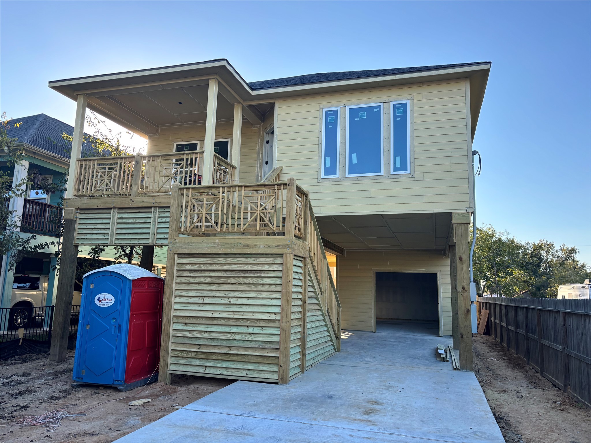 506 Pine Road Kemah, TX 77565 - Photo 2 of 5 a front view of a house with a balcony