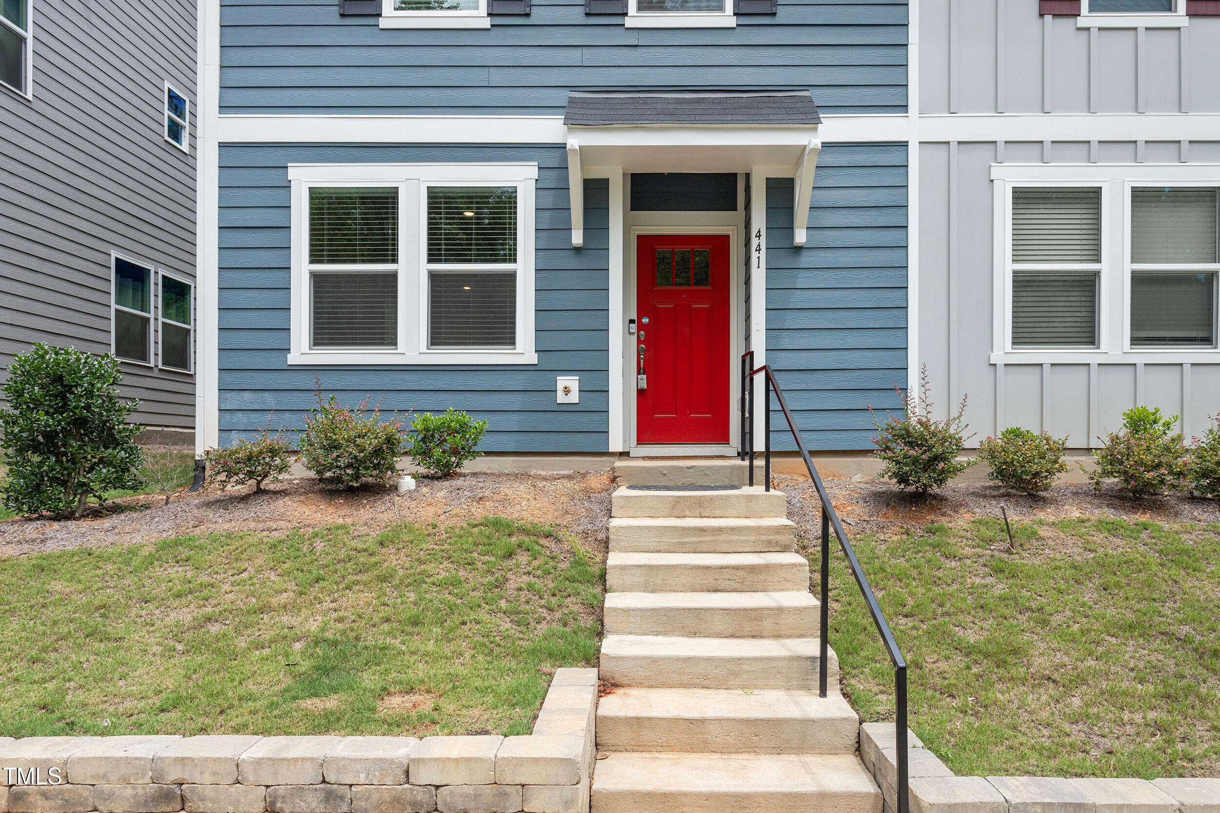 441 Hacksaw Trail Raleigh, NC 27610 - Photo 3 of 29 a front view of a house with garden