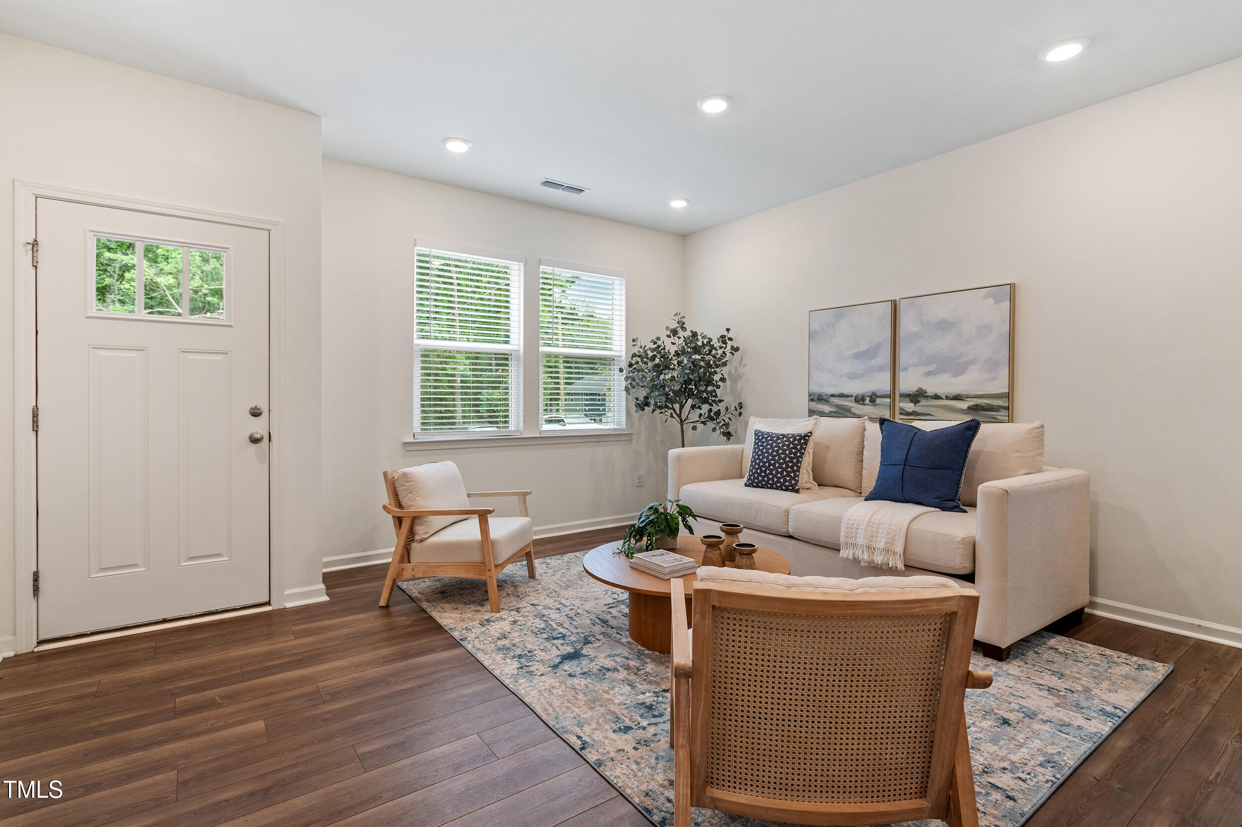 441 Hacksaw Trail Raleigh, NC 27610 - Photo 5 of 29 a living room with furniture and wooden floor