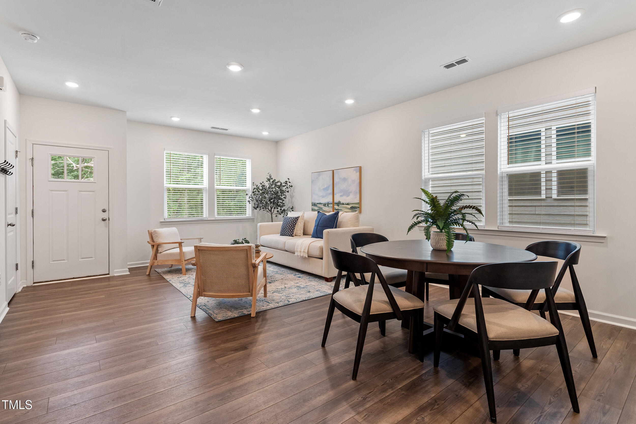 441 Hacksaw Trail Raleigh, NC 27610 - Photo 6 of 29 a dining room with furniture and wooden floor