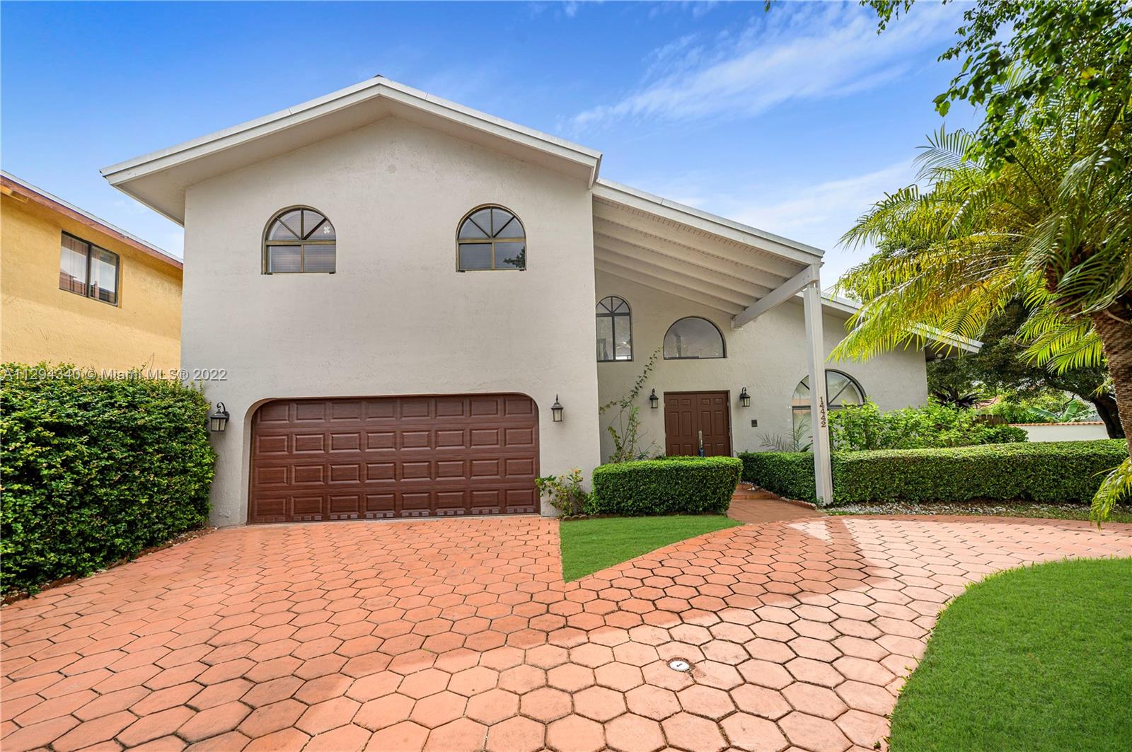 14442 Southwest 111th Street Miami, FL 33186 - Photo 3 of 15 a front view of a house with a yard