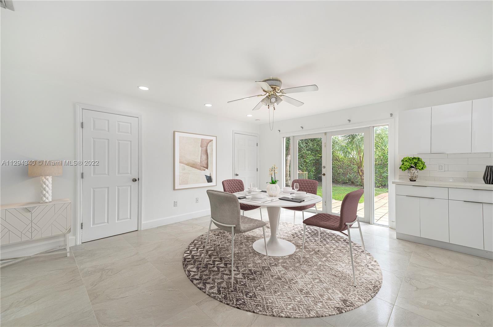14442 Southwest 111th Street Miami, FL 33186 - Photo 9 of 15 a very nice looking dining room with a large window