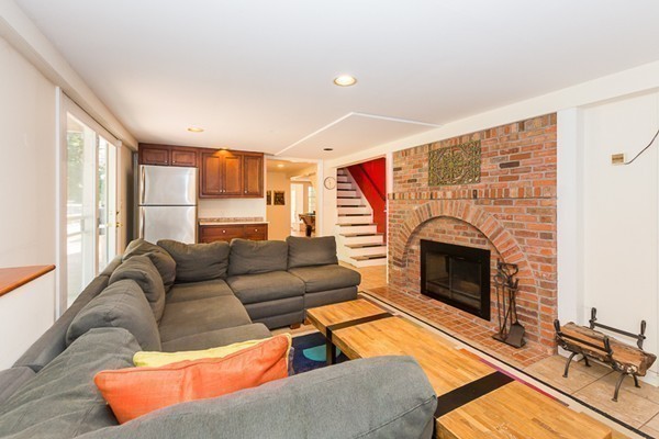 131 River Road Topsfield, MA 01983 - Photo 20 of 30 a living room with furniture and a fireplace