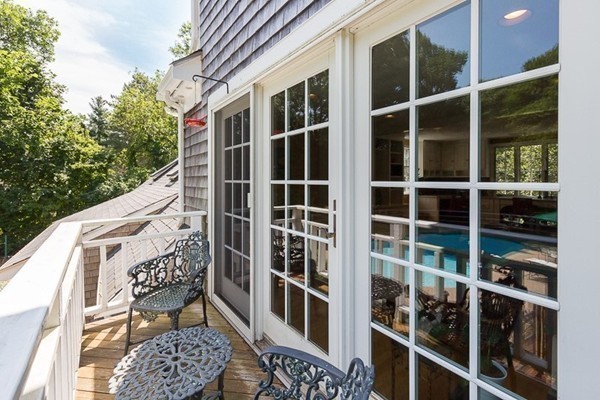 131 River Road Topsfield, MA 01983 - Photo 26 of 30 a balcony with table and chairs