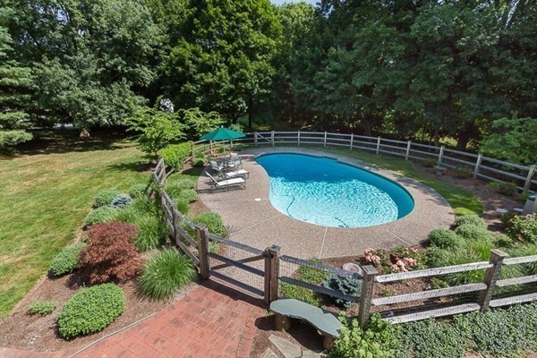 131 River Road Topsfield, MA 01983 - Photo 29 of 30 a view of a swimming pool with a patio