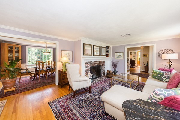 131 River Road Topsfield, MA 01983 - Photo 4 of 30 a living room with furniture and a fireplace