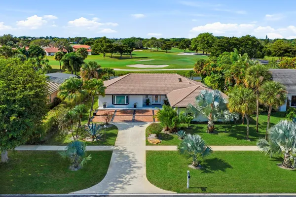a aerial view of a house with a garden