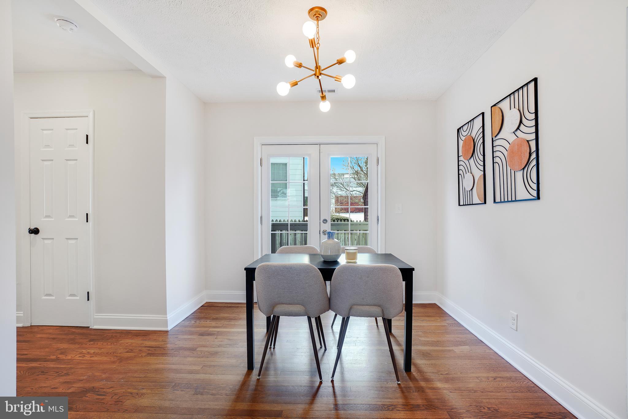 613 Pershing Drive Silver Spring, MD 20910 - Photo 11 of 43 Dining Room with Spoked Lighting