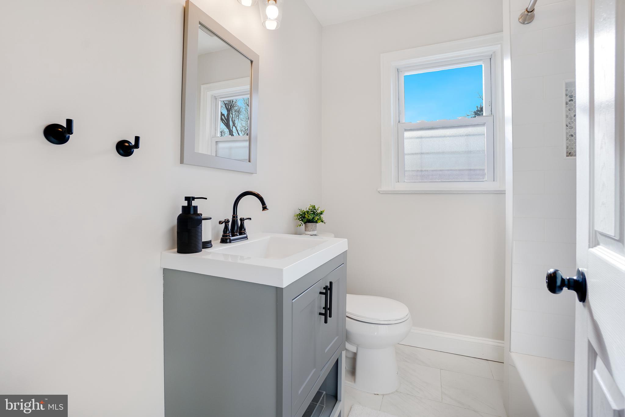 613 Pershing Drive Silver Spring, MD 20910 - Photo 14 of 43 Main Level Full Bathroom