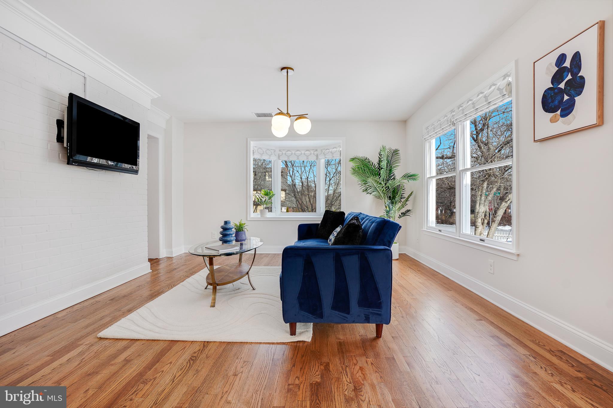 613 Pershing Drive Silver Spring, MD 20910 - Photo 5 of 43 Sun-Drenched Family Room