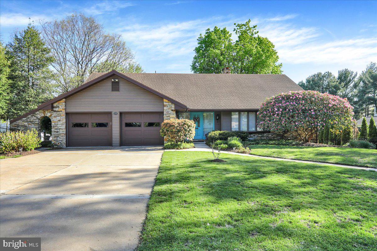 112 Grandview Boulevard Wyomissing, PA 19609 - Photo 2 of 69 a house with a big yard plants and large trees