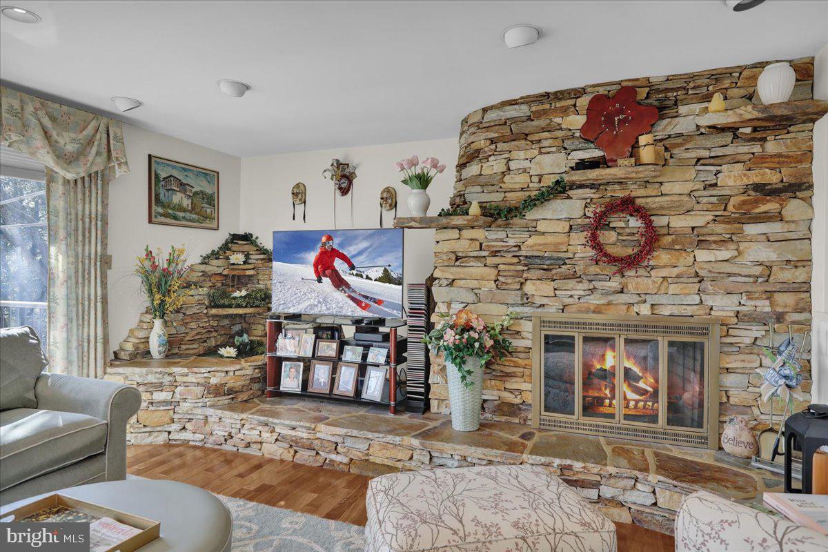 112 Grandview Boulevard Wyomissing, PA 19609 - Photo 22 of 69 a living room with fireplace furniture and a rug