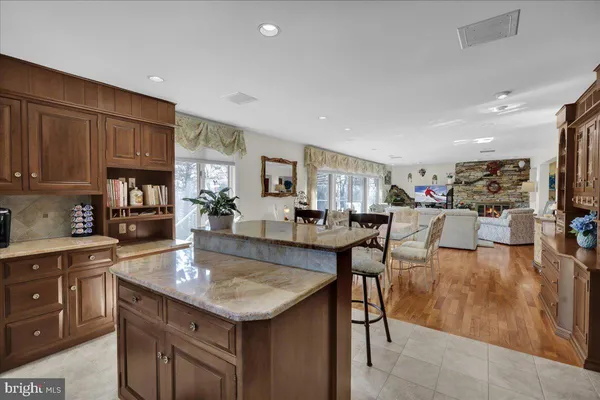 a spacious bathroom with a double vanity sink and a mirror