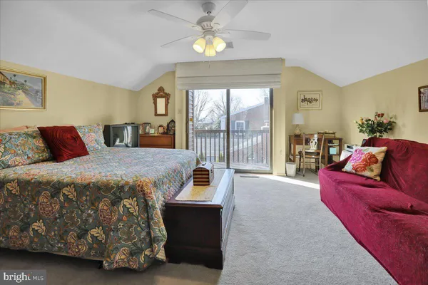 a kitchen with stainless steel appliances granite countertop a refrigerator and a stove
