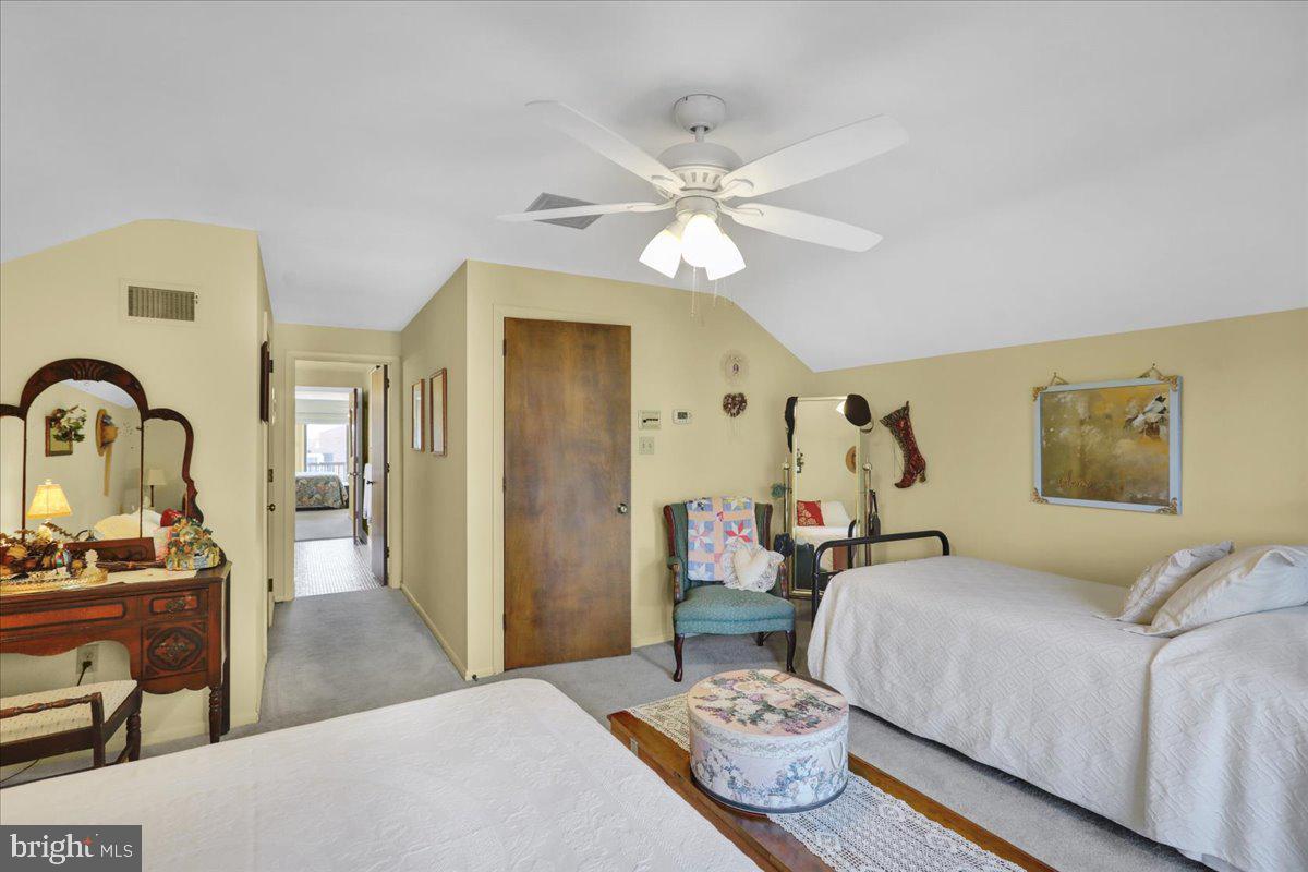 112 Grandview Boulevard Wyomissing, PA 19609 - Photo 47 of 69 a bedroom with a bed and a chandelier