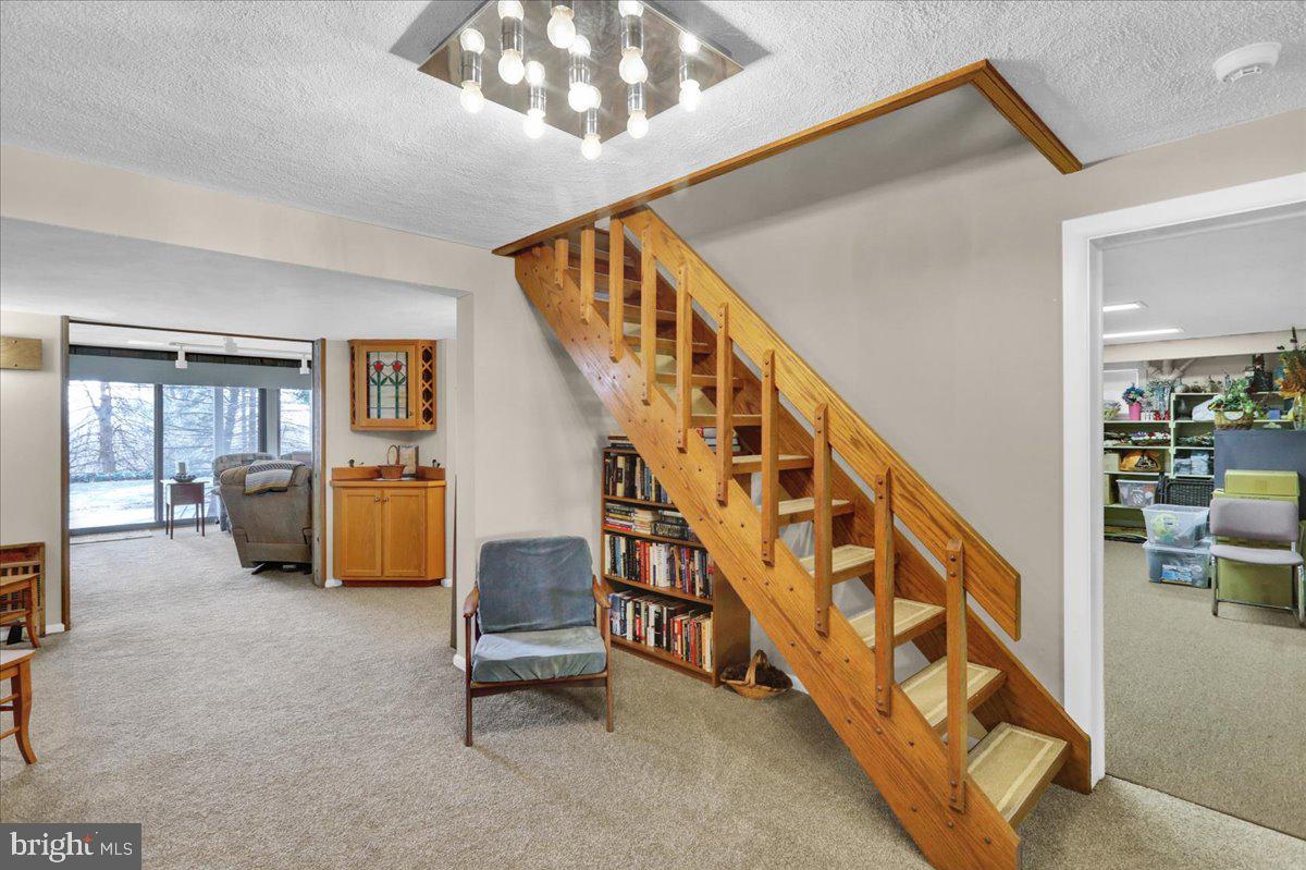 112 Grandview Boulevard Wyomissing, PA 19609 - Photo 48 of 69 a living room with stairs and a furniture