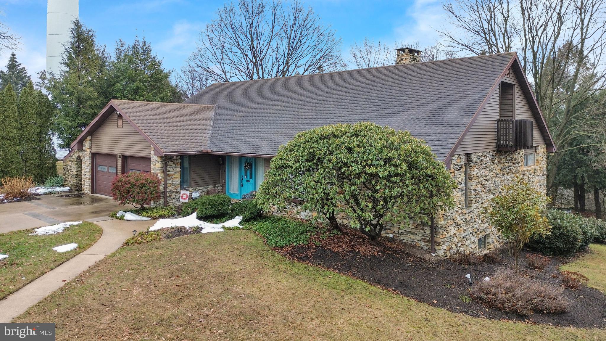 112 Grandview Boulevard Wyomissing, PA 19609 - Photo 64 of 69 a front view of a house with a yard and garage