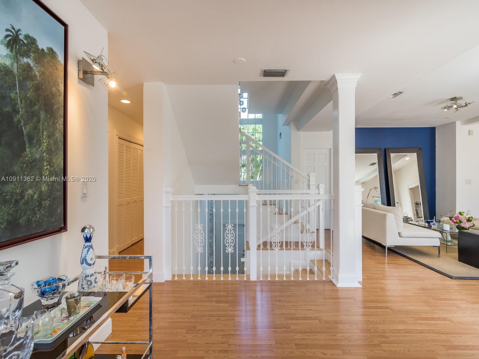 325 Pacific Road Key Biscayne, FL 33149 - Photo 10 of 31 a view of a living room and dining room