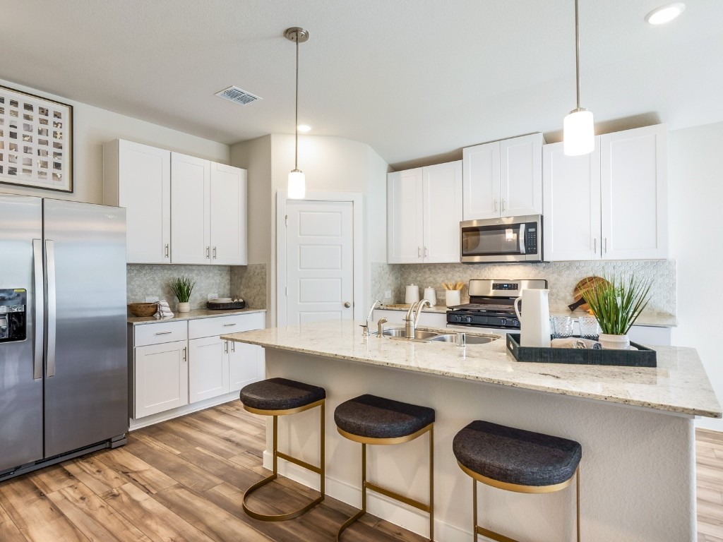 1665 Hopson Ranch Drive Conroe, TX 77301 - Photo 2 of 26 Photo is not of the actual home, but is an inspirational photo of builder’s model home and may depict options, furnishings, and/or decorator features that are not included