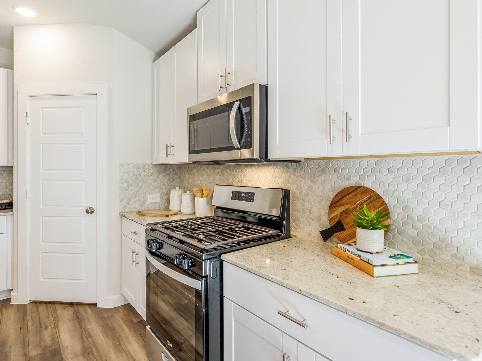 1665 Hopson Ranch Drive Conroe, TX 77301 - Photo 3 of 26 Photo is not of the actual home, but is an inspirational photo of builder’s model home and may depict options, furnishings, and/or decorator features that are not included