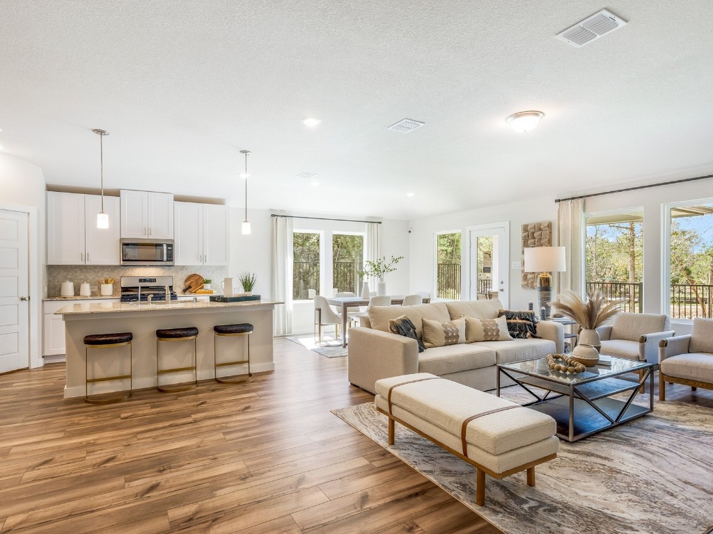 1665 Hopson Ranch Drive Conroe, TX 77301 - Photo 8 of 26 Photo is not of the actual home, but is an inspirational photo of builder’s model home and may depict options, furnishings, and/or decorator features that are not included