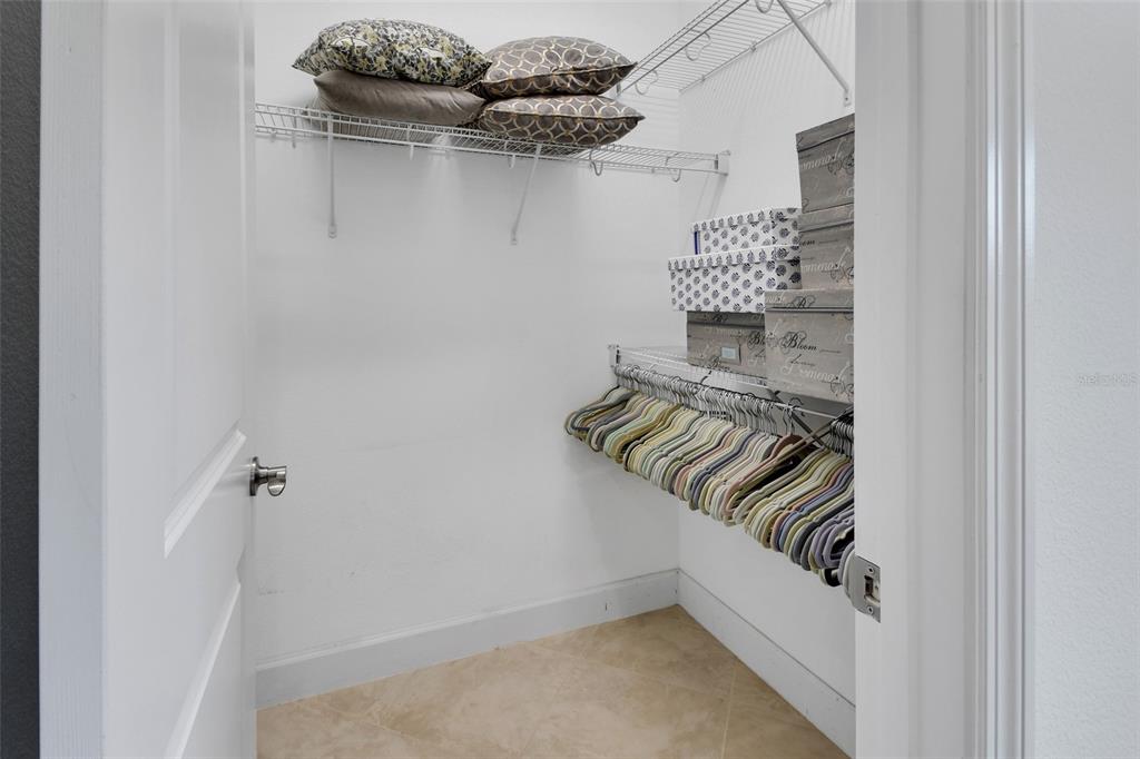 308 Locksley Court Deland, FL 32724 - Photo 20 of 56 a close view of walk in closet